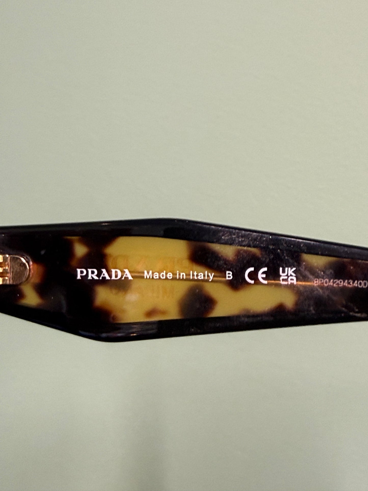 Prada Cat-Eye Sunglasses – Tortoiseshell